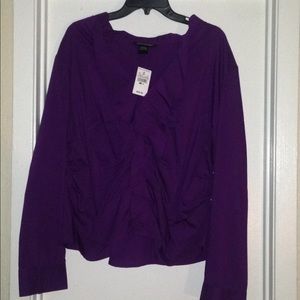 Ashley Stewart ruffled button up blouse.